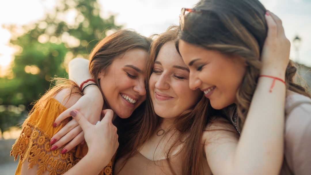 A family embracing at sunset